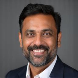 Professional headshot of Sunil Verma